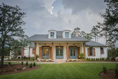 acadian style house with metal roof|acadian style house exterior.